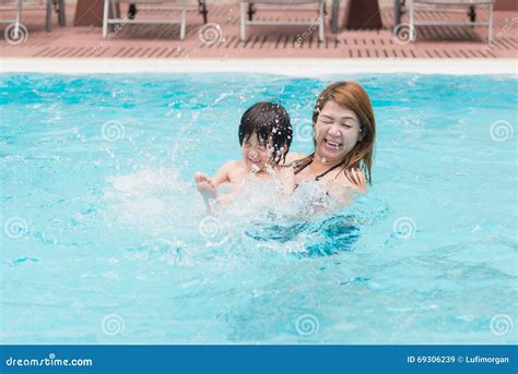 Pink had her. . Japanese mom and son swimming